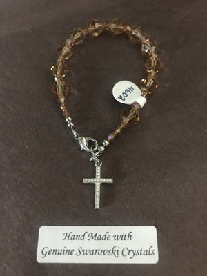 8mm Beige crystal decade Rosary bracelet with genuine Swarovski crystals and a sterling silver cross.