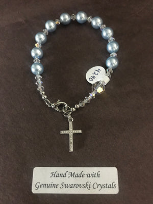 8mm Light Blue Pearl Decade Rosary bracelet with genuine Swarovski crystal accents and a sterling silver cross.