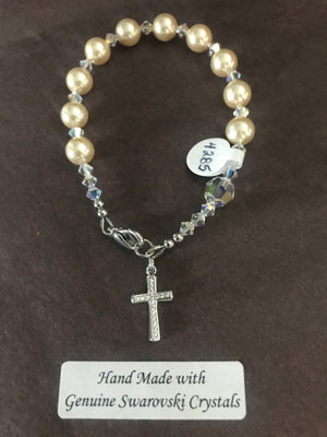 6mm light gold Pearl decade Rosary bracelet with genuine Swarovski crystal accents and a sterling silver cross.