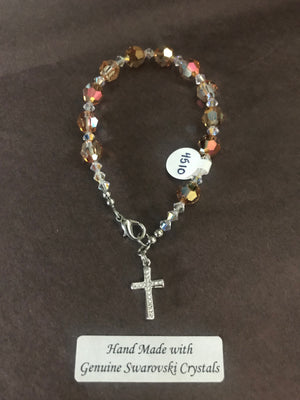 8mm Metallic Sunshine (light amber) crystal decade Rosary bracelet with genuine Swarovski crystals and a sterling silver cross.