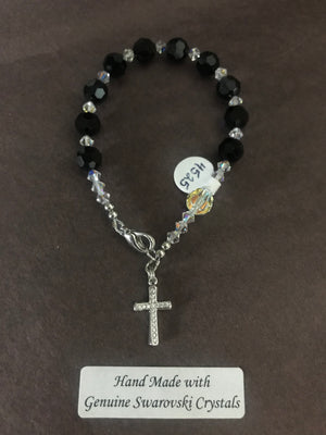 8mm jet black faceted crystal decade Rosary bracelet with genuine Swarovski crystals and a sterling silver cross.